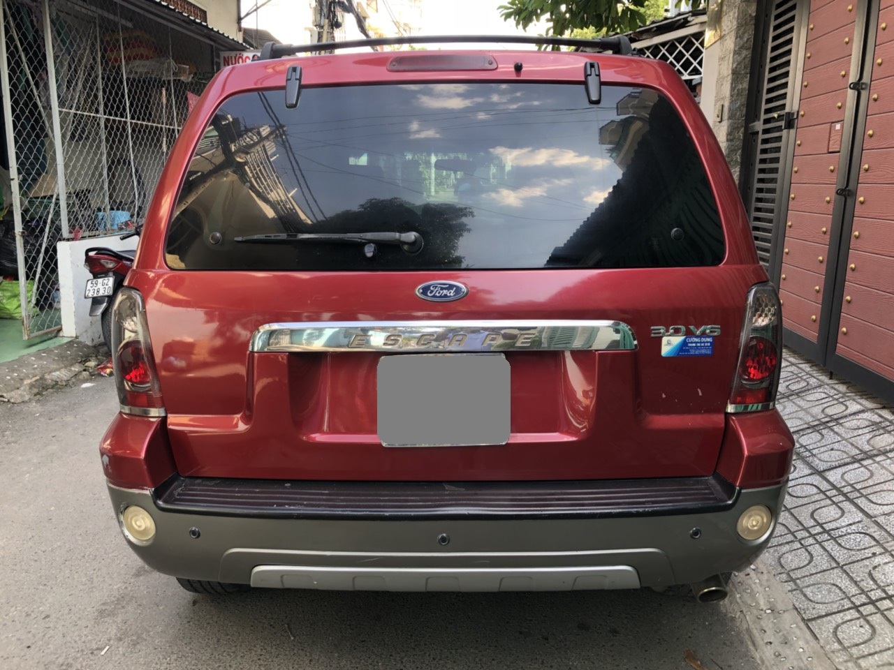 Ford Escape AT 2005 - Cần bán Ford Escape 2005 tự động màu đỏ độc nhất Sài Gòn