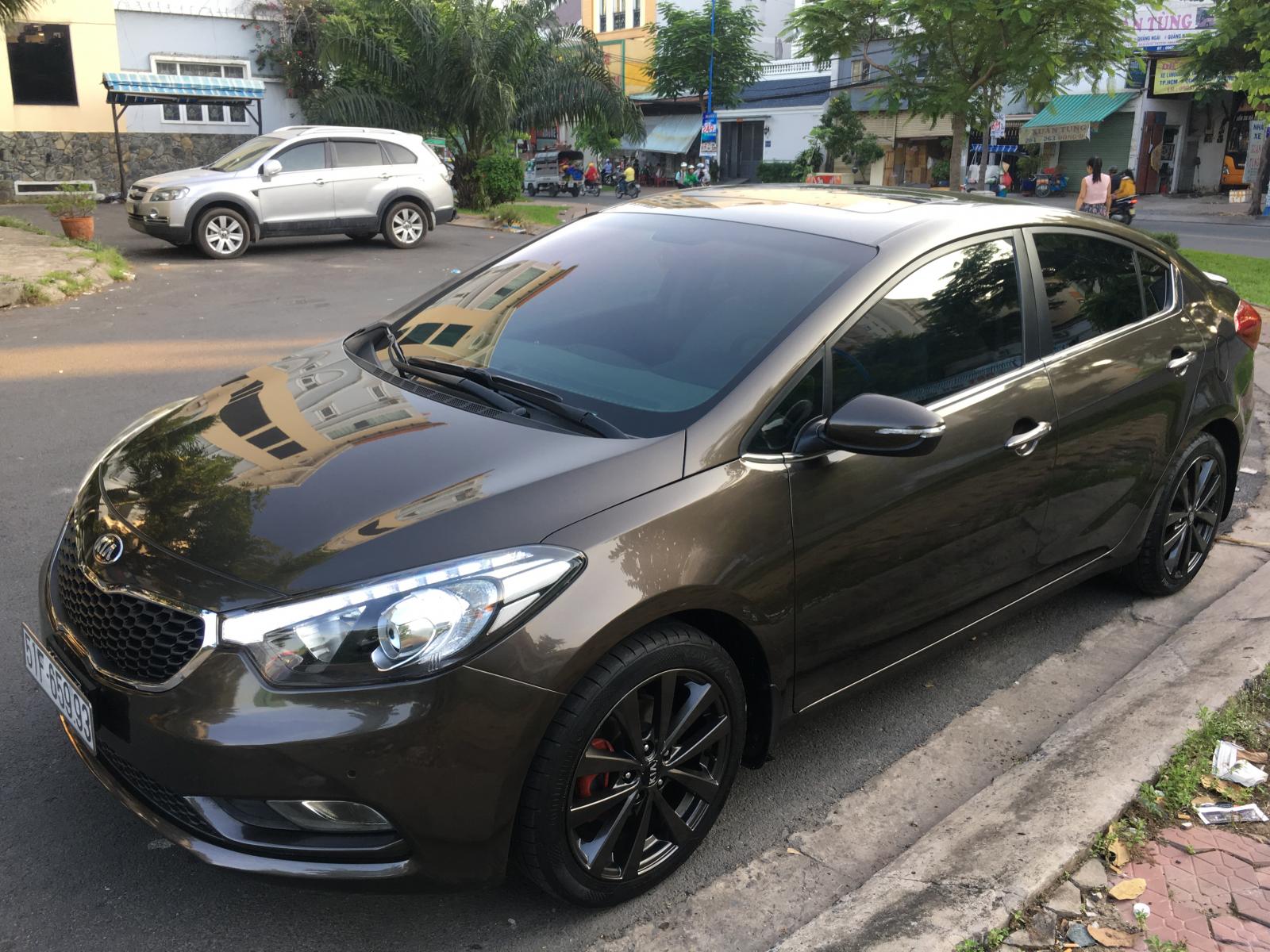 Kia K3 2.0AT 2016 - Cần bán xe Kia K3 2.0AT màu nâu 4/2016