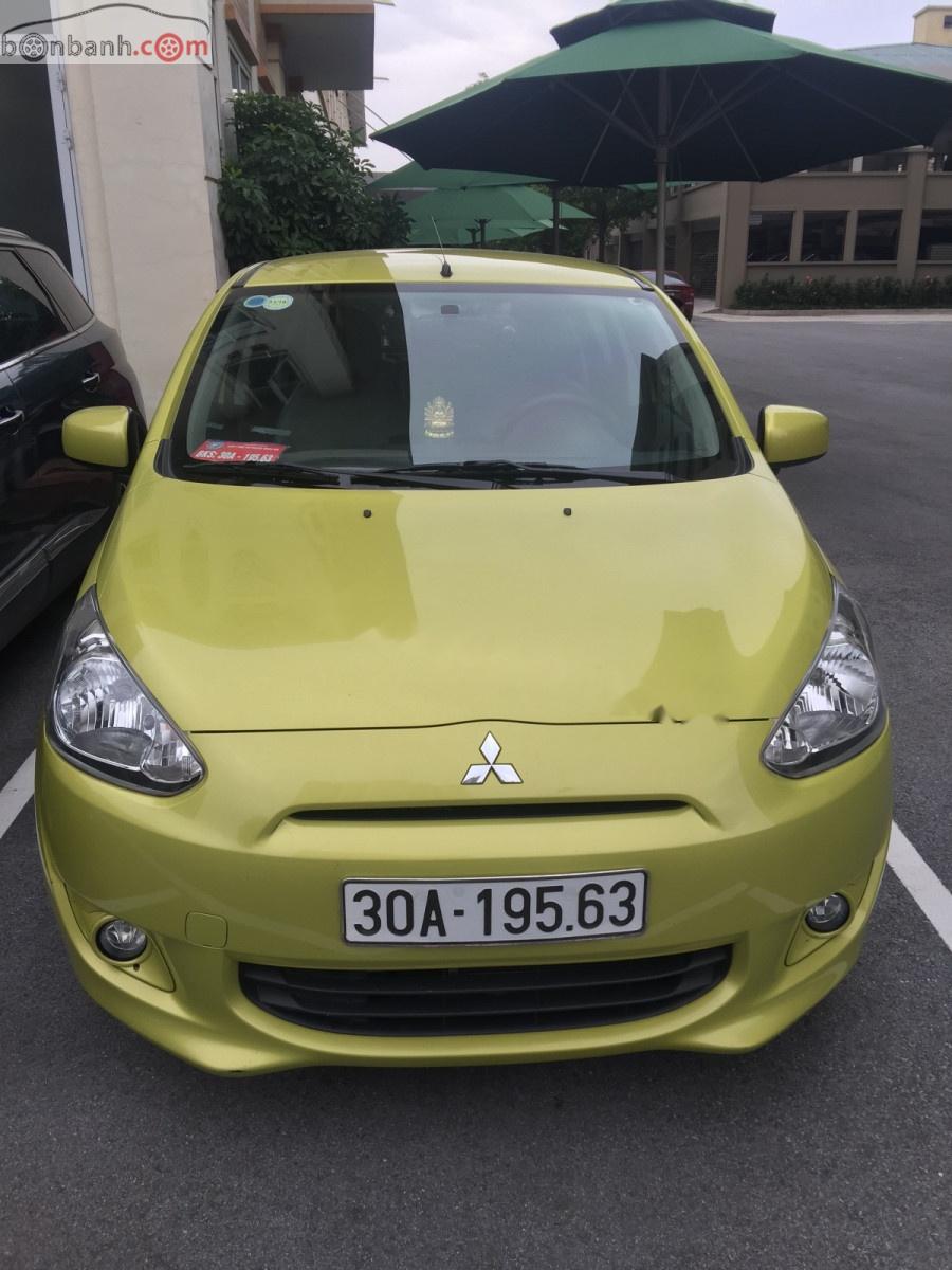 Mitsubishi Mirage 1.2 AT 2014 - Cần bán lại xe Mitsubishi Mirage 1.2 AT đời 2014, màu vàng, xe nhập còn mới