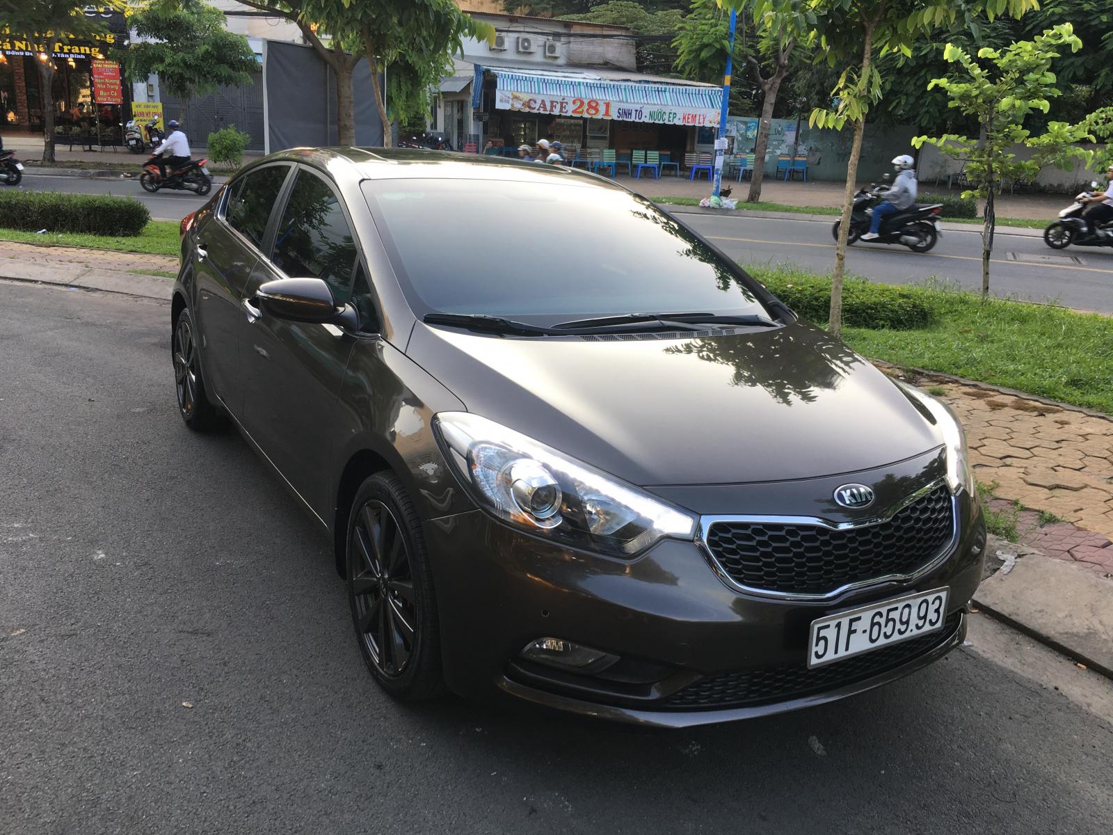 Kia K3 2.0AT 2016 - Cần bán xe Kia K3 2.0AT màu nâu 4/2016