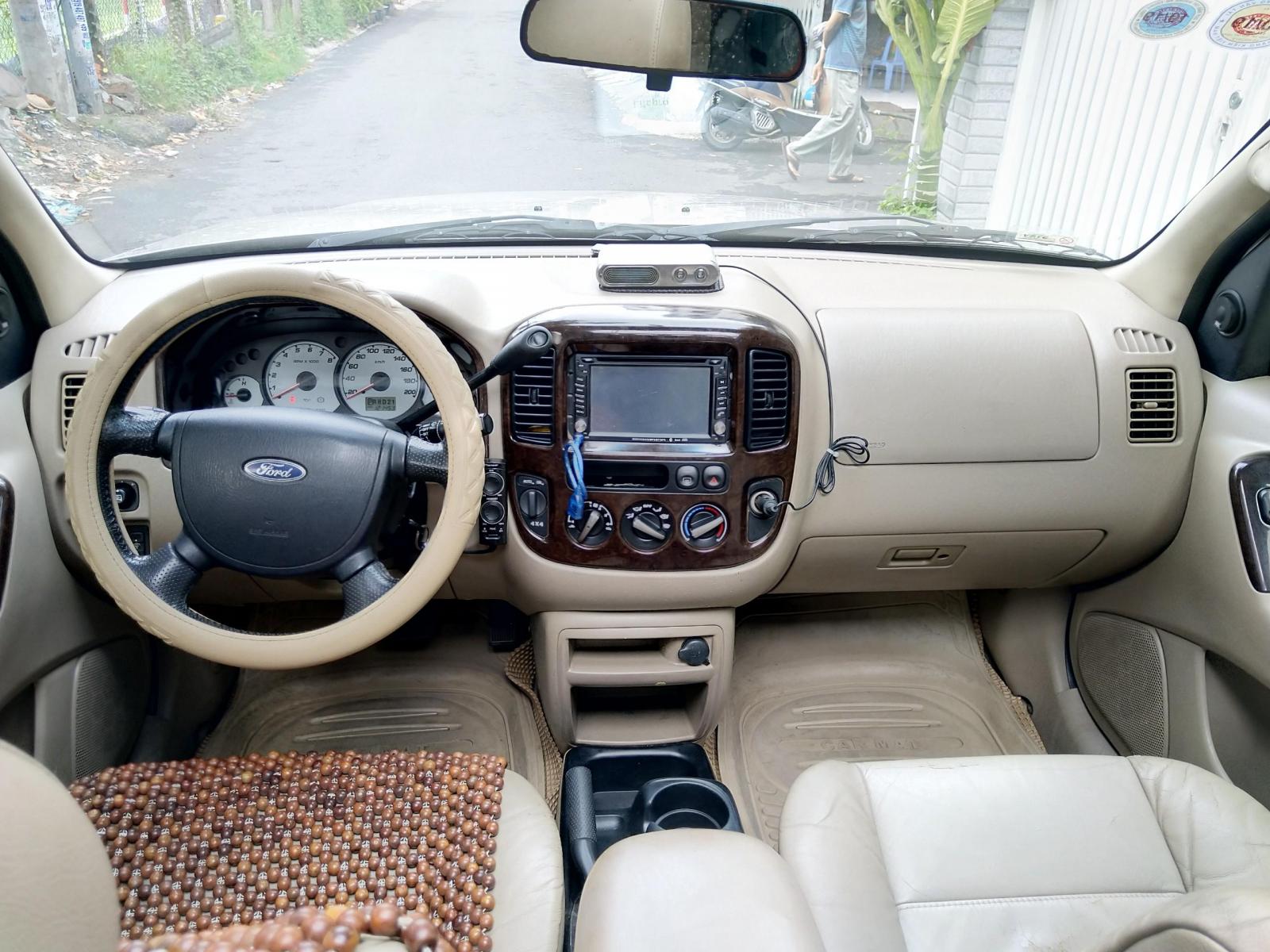 Ford Escape 2007 - Cần bán con Escape 2007, màu bạc, số tự động