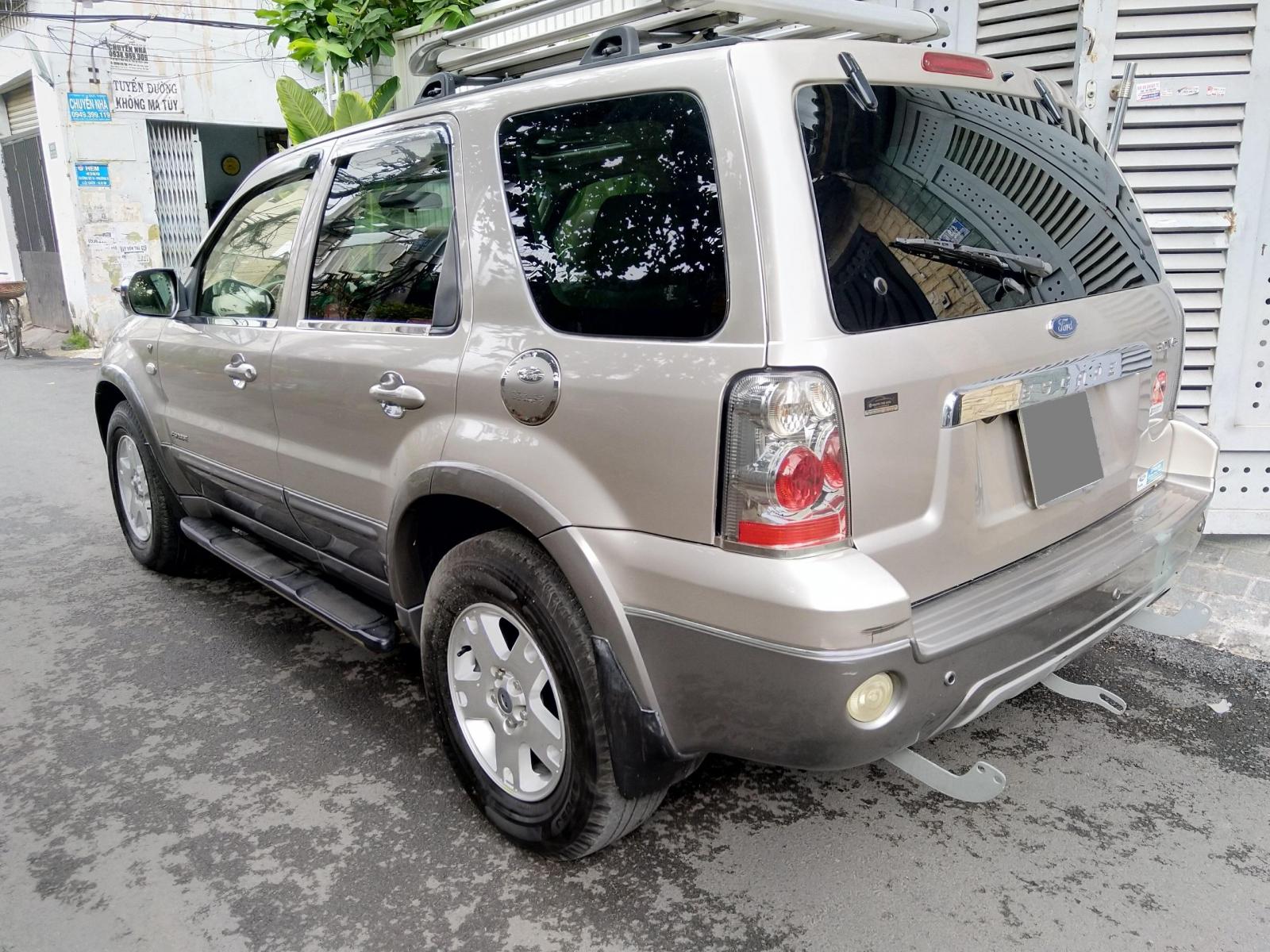 Ford Escape 2007 - Cần bán con Escape 2007, màu bạc, số tự động