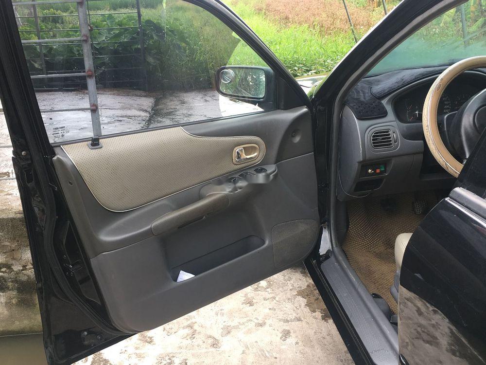 Ford Laser 2001 - Bán Ford Laser sản xuất năm 2001, màu đen, nhập khẩu