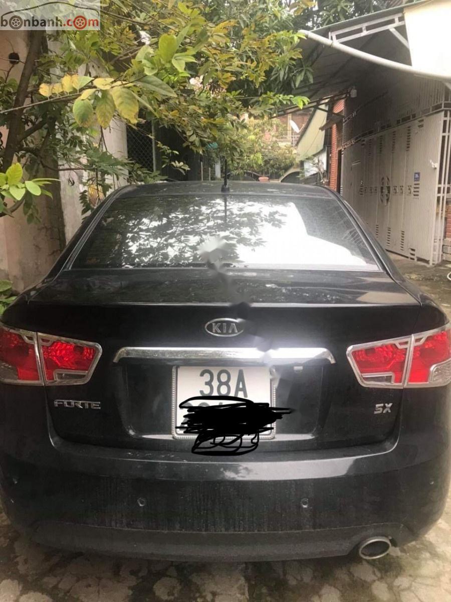 Kia Forte 2012 - Bán xe cũ Kia Forte 2012, màu đen