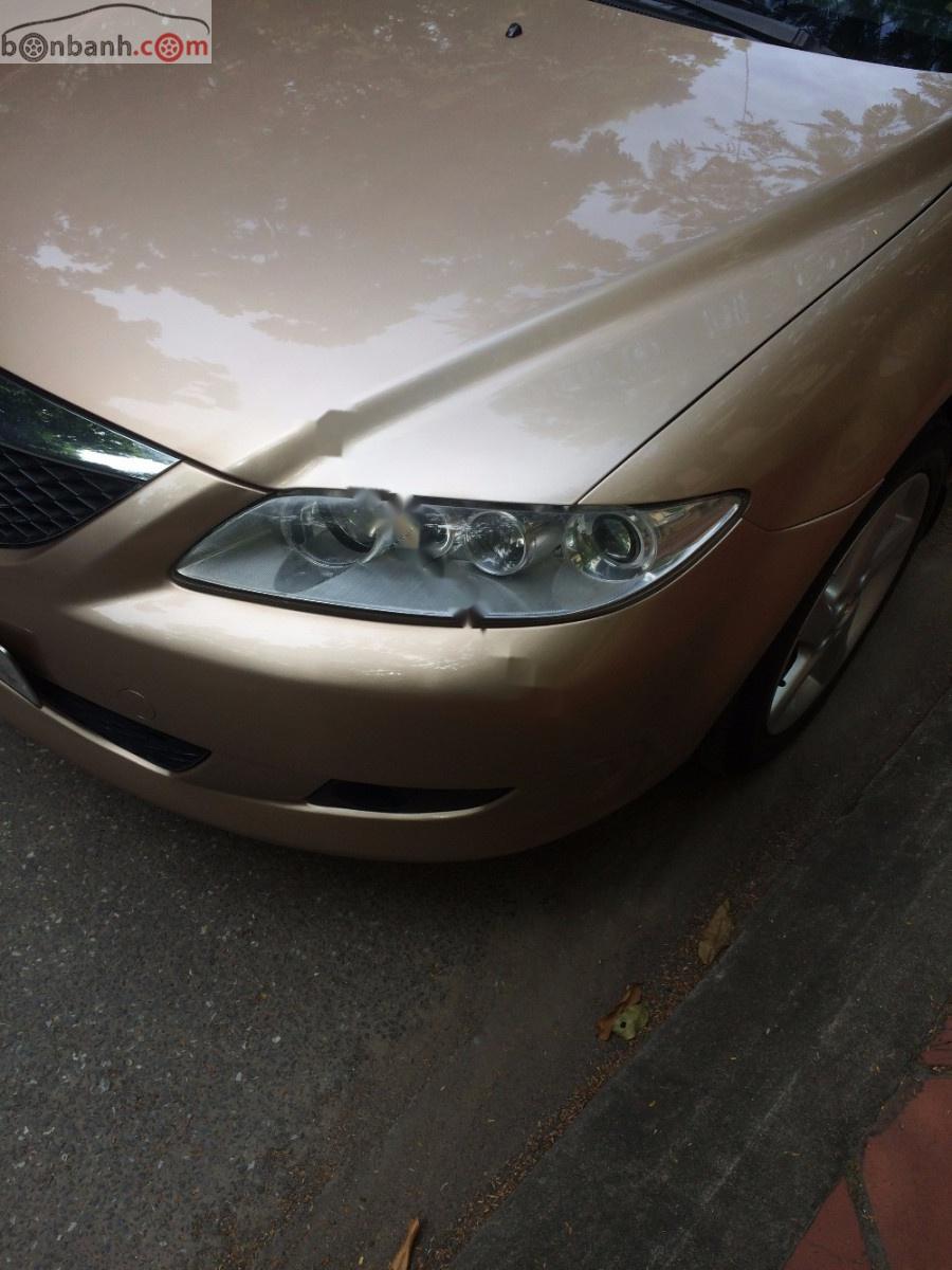 Mazda 6 2003 - Cần bán xe cũ Mazda 6 năm 2003, màu vàng, nhập khẩu