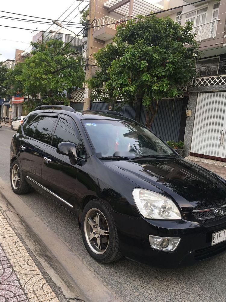 Kia Carens   2009 - Cần bán Kia Carens đời 2009, màu đen, nhập khẩu