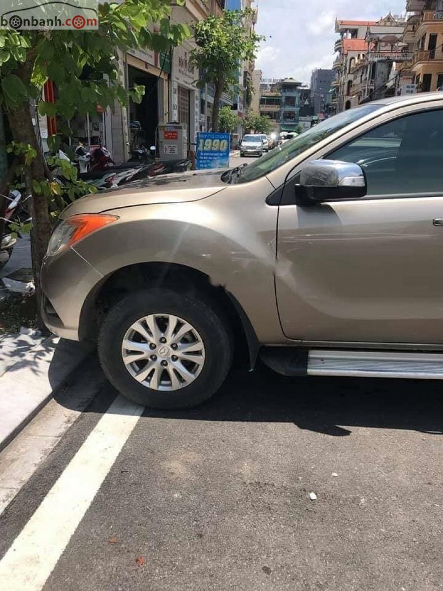 Mazda BT 50 2013 - Cần bán Mazda BT 50 2013, màu vàng, xe nhập  