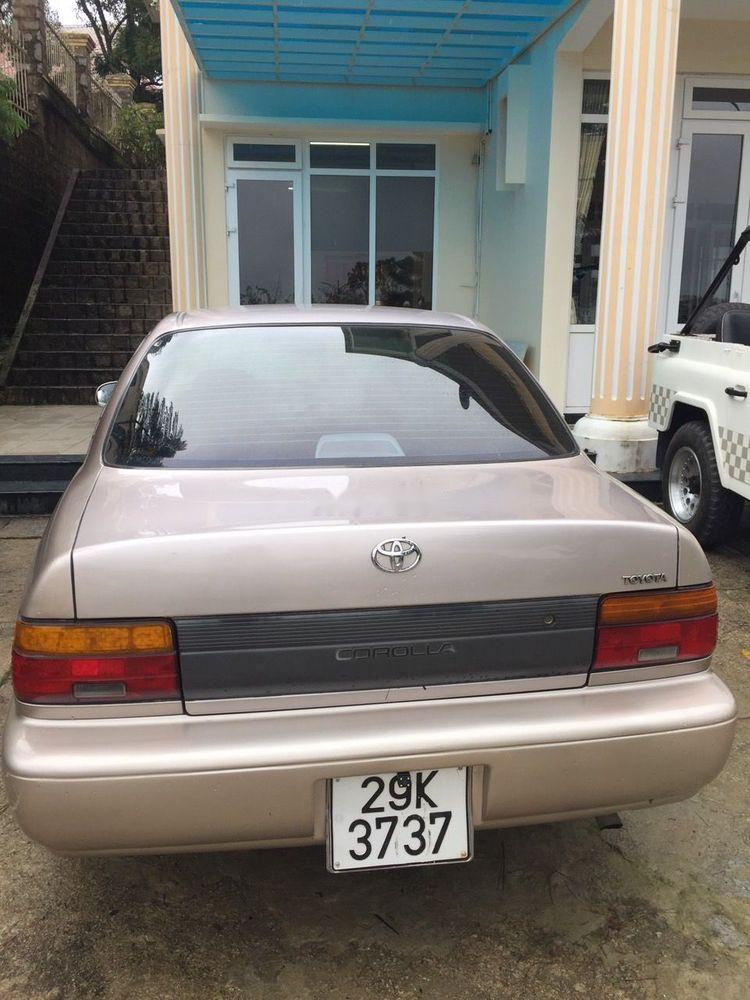 Toyota Corolla   1997 - Cần bán Toyota Corolla 1997, màu vàng, xe nhập  
