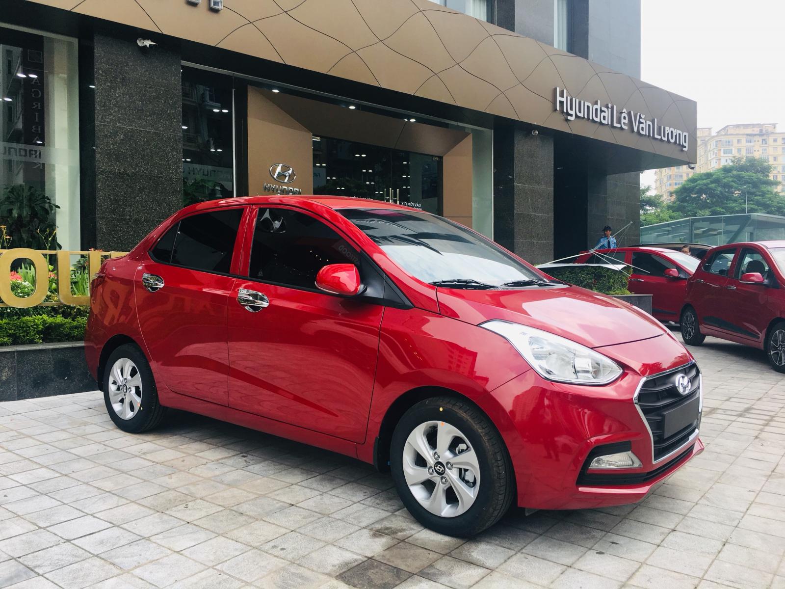 Hyundai Grand i10 1.2 AT   2019 - Bán Hyundai 1.2 AT sedan 2019, màu đỏ sẵn xe giao ngay, hỗ trợ trả góp lên đến 80%, chỉ 100tr nhận xe