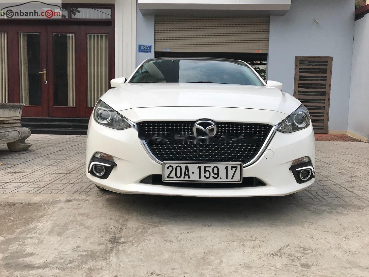 Mazda 3 2016 - Cần bán gấp Mazda 3 sản xuất năm 2016, màu trắng giá cạnh tranh