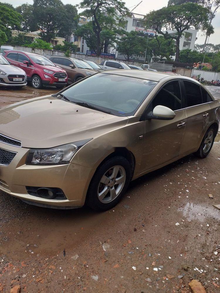 Chevrolet Cruze   2013 - Bán Chevrolet Cruze đời 2013, màu vàng số sàn