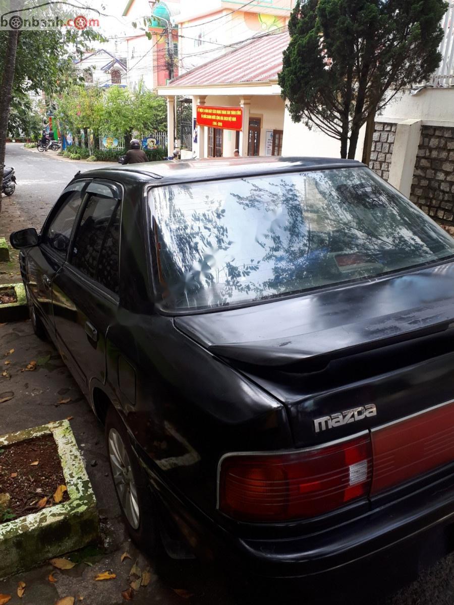 Mazda 323   1995 - Bán Mazda 323 đời 1995, màu đen, xe nhập