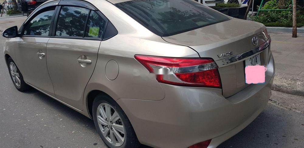 Toyota Vios 2015 - Cần bán gấp Toyota Vios 2015, màu vàng số tự động, 480tr