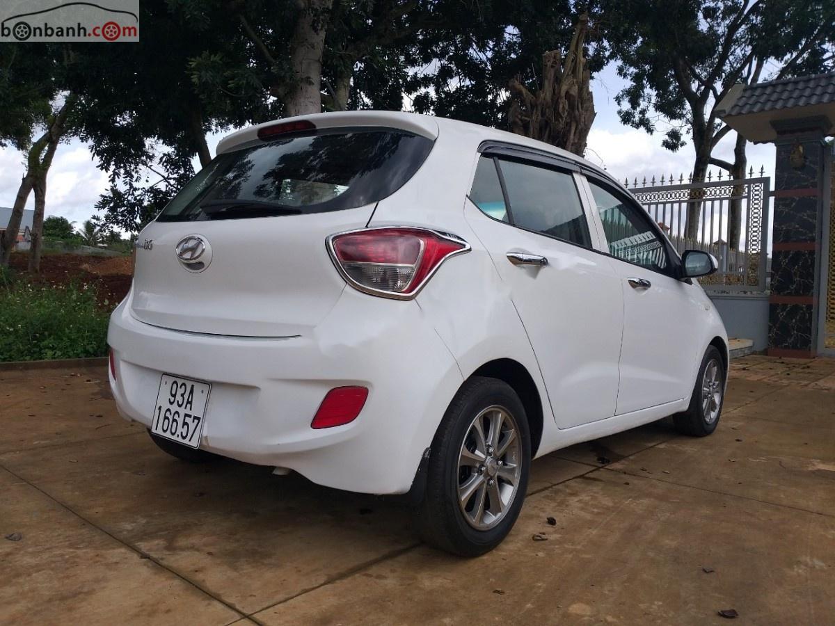 Hyundai Grand i10 2014 - Cần bán xe Hyundai Grand i10 năm 2014, màu trắng, nhập khẩu