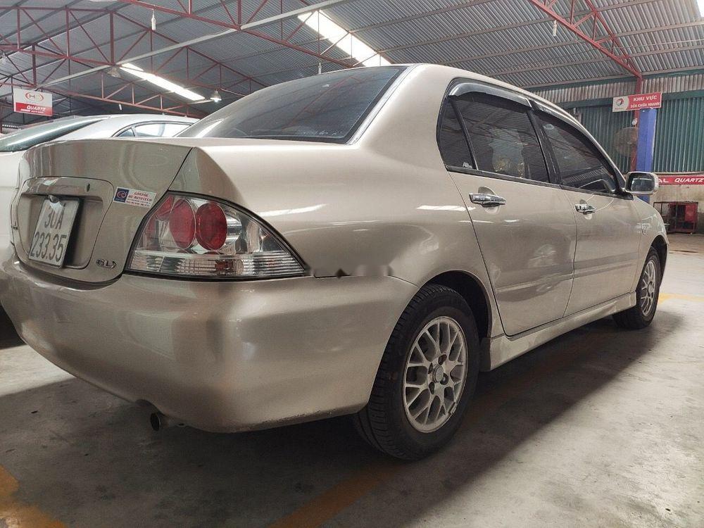 Mitsubishi Lancer   2004 - Bán Mitsubishi Lancer đời 2004, màu vàng, 195tr