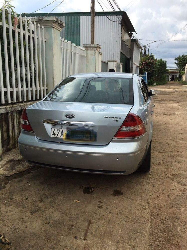 Ford Mondeo   2004 - Bán Ford Mondeo 2004, màu bạc, xe nhập, giá tốt