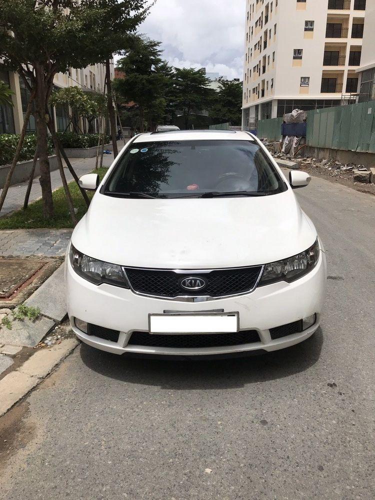 Kia Cerato 2010 - Cần bán gấp Kia Cerato 2010, màu trắng, xe nhập chính chủ