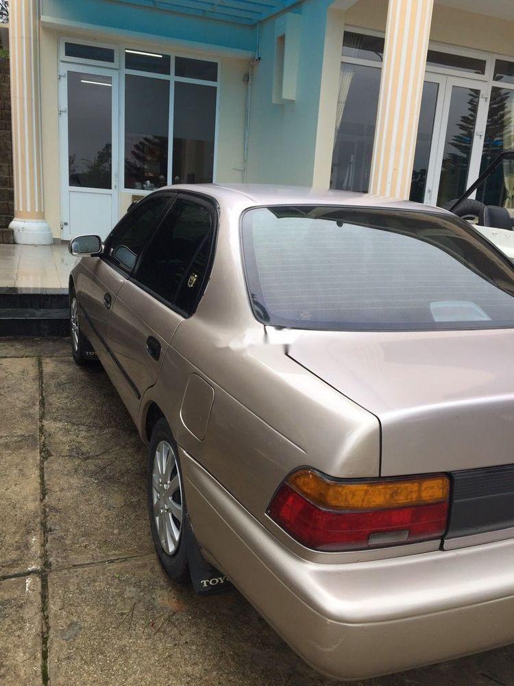 Toyota Corolla   1997 - Cần bán Toyota Corolla 1997, màu vàng, xe nhập  