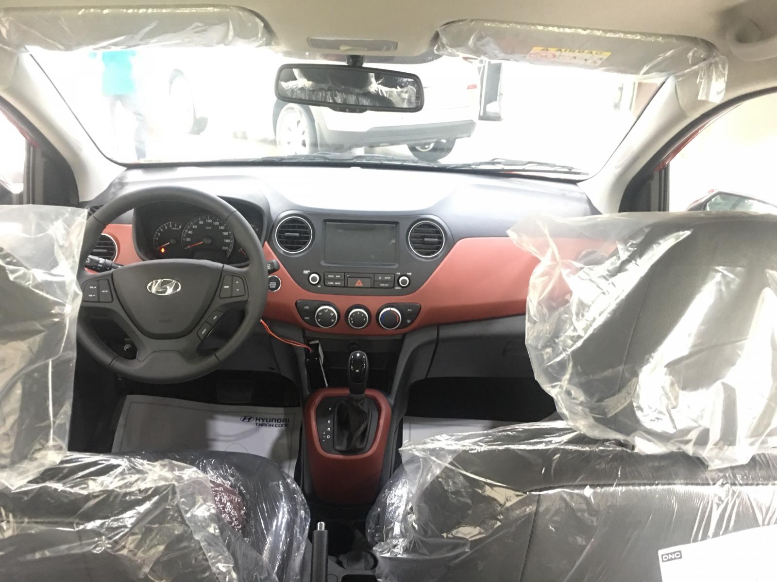 Hyundai Grand i10 1.2 AT   2019 - Bán Hyundai 1.2 AT sedan 2019, màu đỏ sẵn xe giao ngay, hỗ trợ trả góp lên đến 80%, chỉ 100tr nhận xe