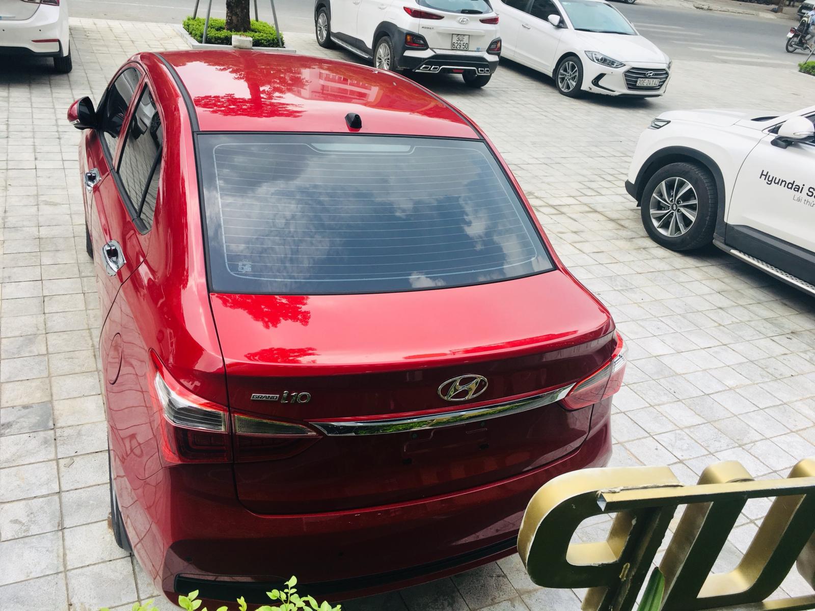 Hyundai Grand i10 1.2 AT   2019 - Bán Hyundai 1.2 AT sedan 2019, màu đỏ sẵn xe giao ngay, hỗ trợ trả góp lên đến 80%, chỉ 100tr nhận xe