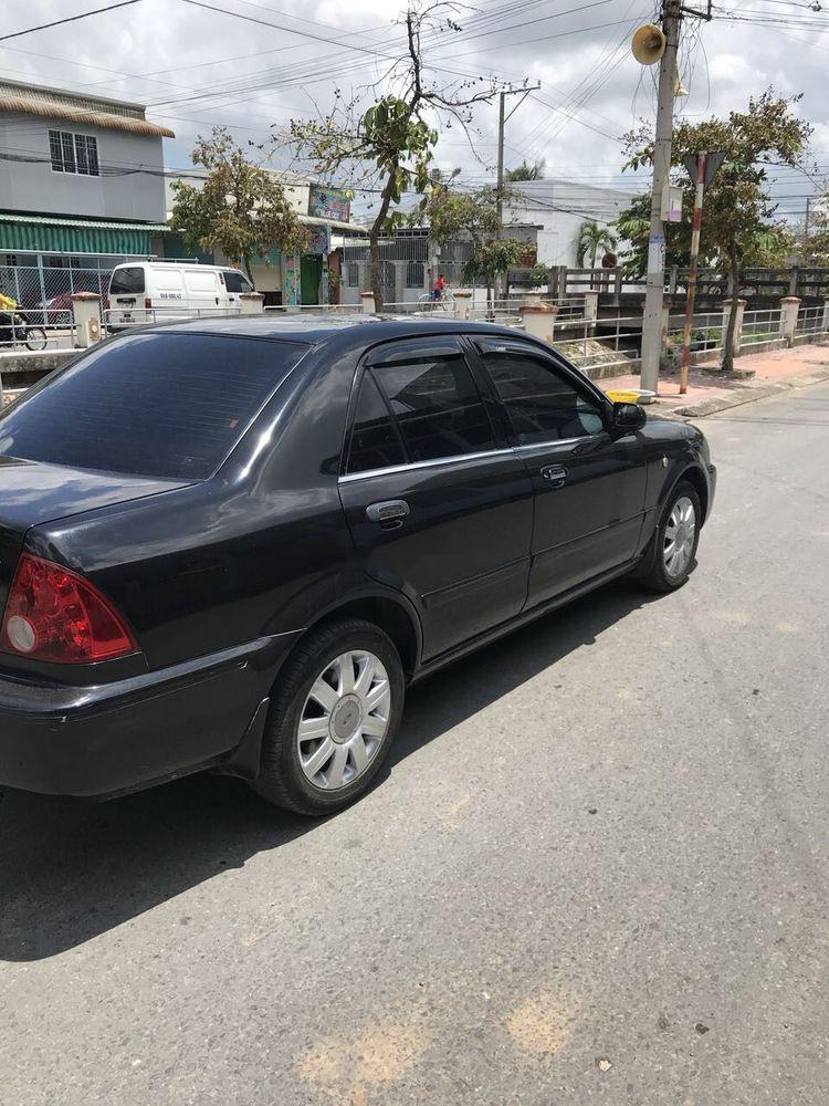 Ford Laser 2002 - Cần bán Ford Laser đời 2002, màu đen, xe nhập chính chủ, giá 180tr