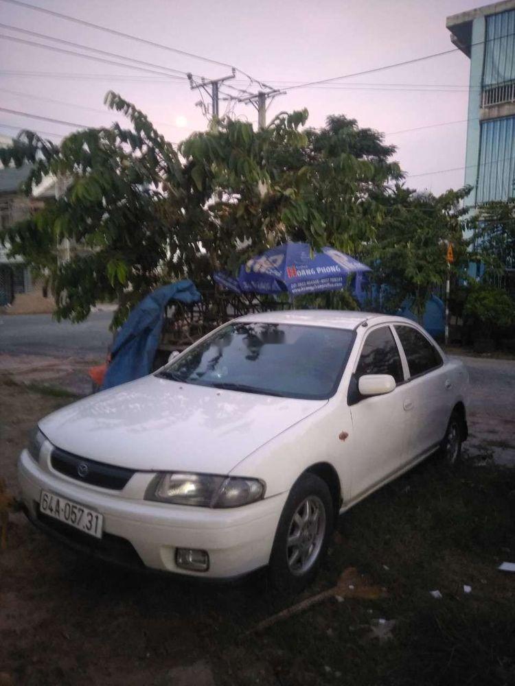 Mazda 323 1999 - Cần bán gấp Mazda 323 sản xuất năm 1999, màu trắng, nhập khẩu