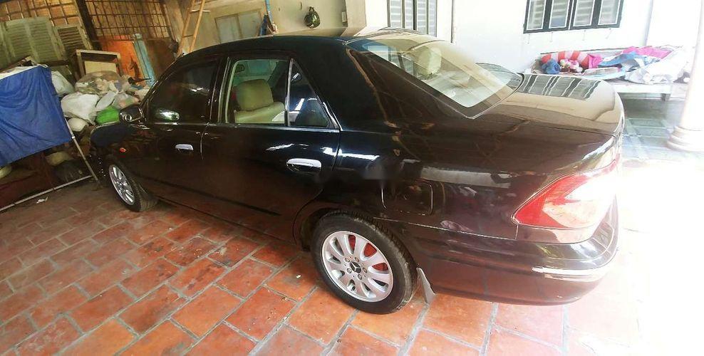 Mazda 626 1999 - Cần bán Mazda 626 đời 1999, màu đen, xe nhập chính chủ, giá 165tr