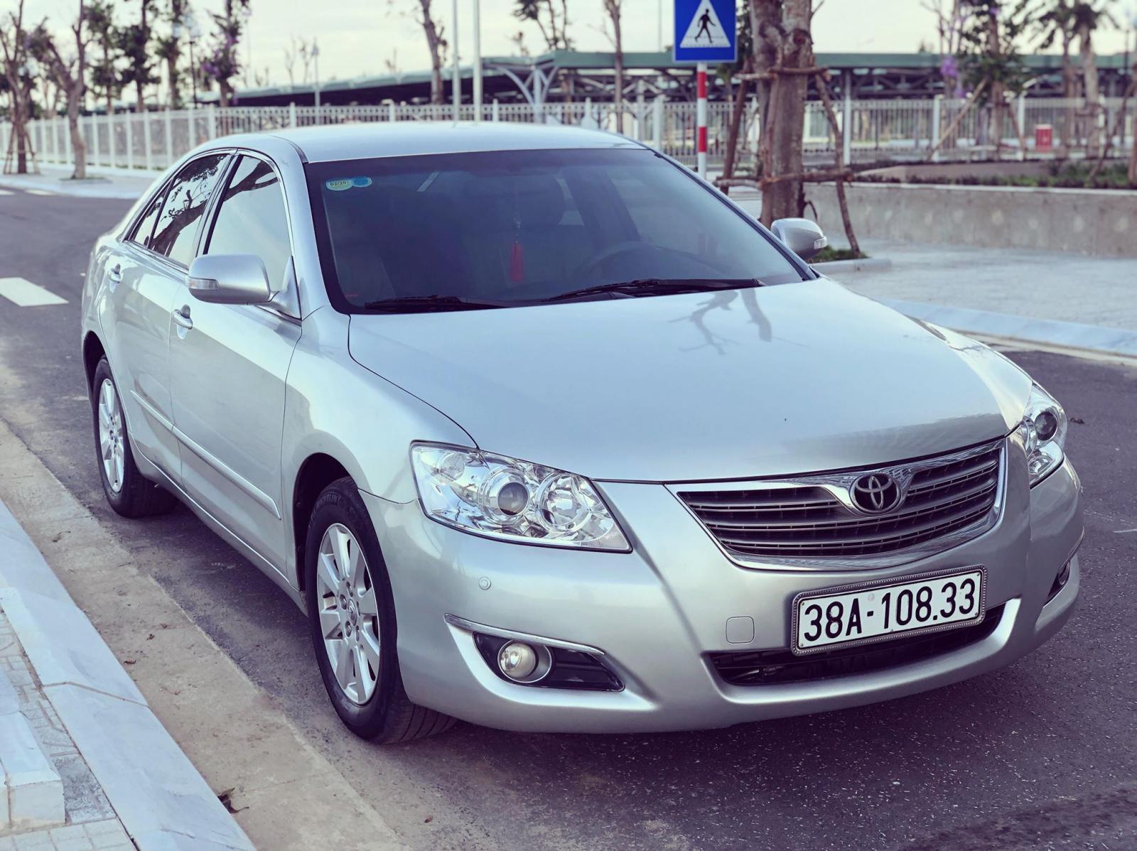 Toyota Camry 2.4G 2007 - Bán Toyota Camry 2.4G đời 2007, màu bạc như mới