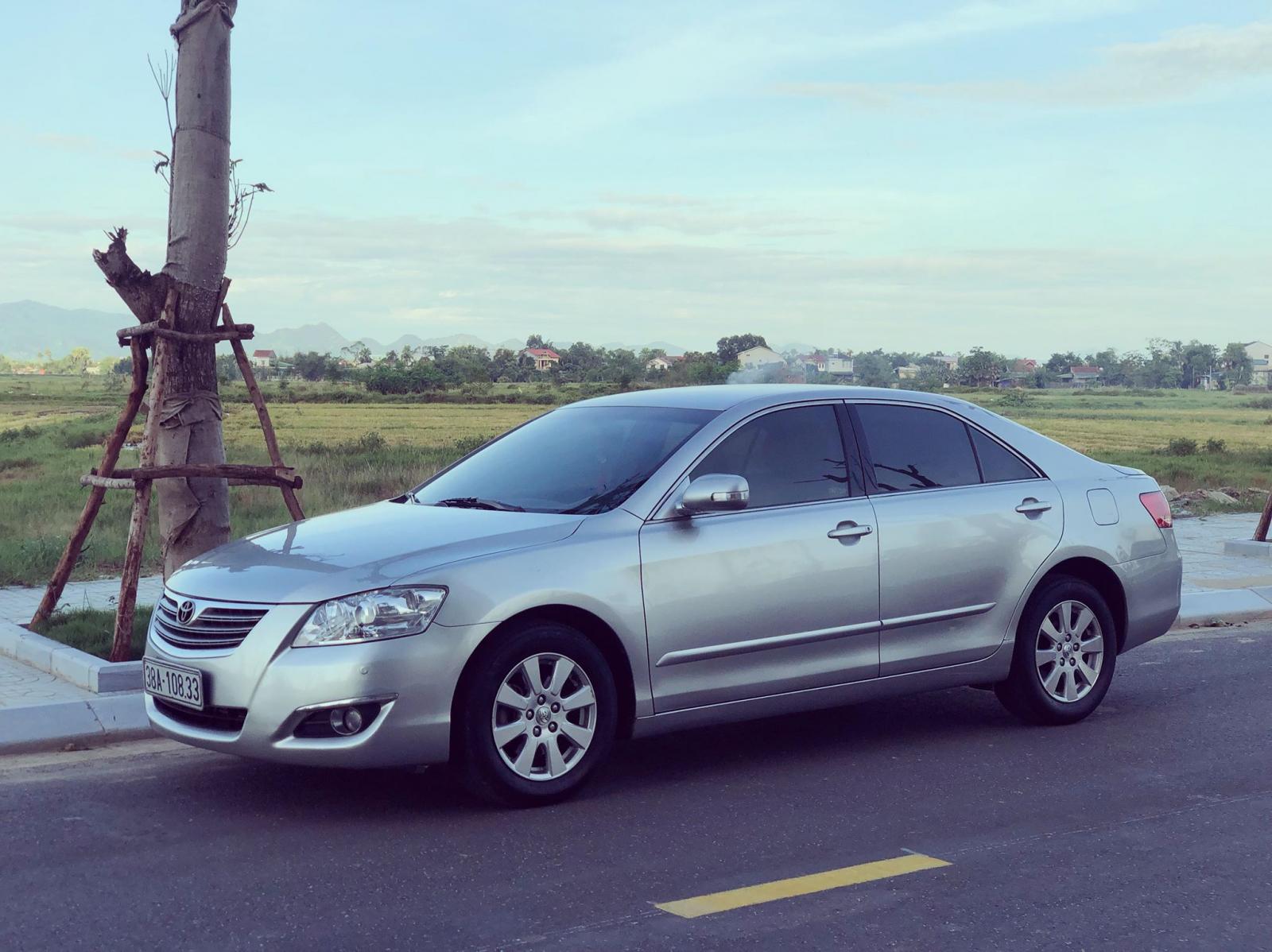 Toyota Camry 2.4G 2007 - Bán Toyota Camry 2.4G đời 2007, màu bạc như mới