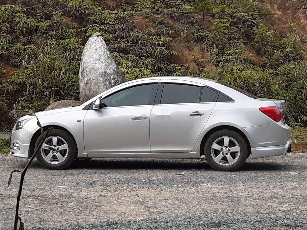 Chevrolet Cruze   2012 - Bán ô tô Chevrolet Cruze sản xuất 2012, màu bạc