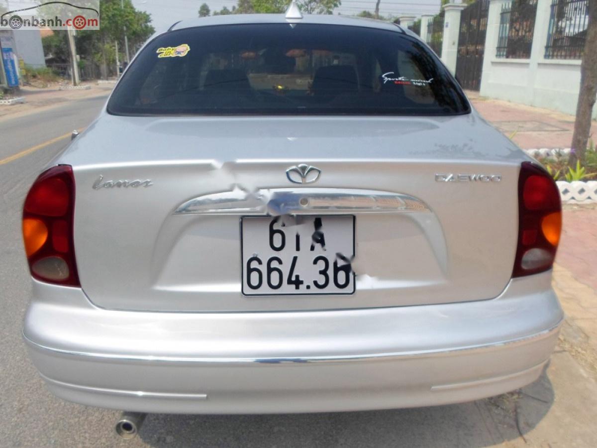 Daewoo Lanos SX 2005 - Bán Daewoo Lanos SX 2005, màu bạc còn mới