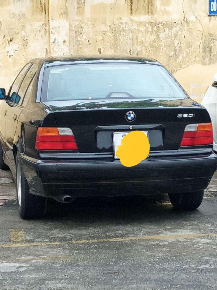 BMW 3 Series   1997 - Bán BMW 320 1997, màu đen, xe nhập  