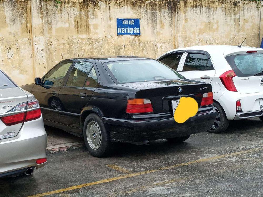 BMW 3 Series   1997 - Bán BMW 320 1997, màu đen, xe nhập  