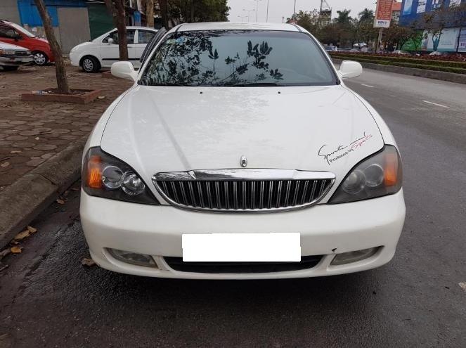 Daewoo Magnus 2004 - Bán ô tô Daewoo đời 2004, màu trắng giá cạnh tranh