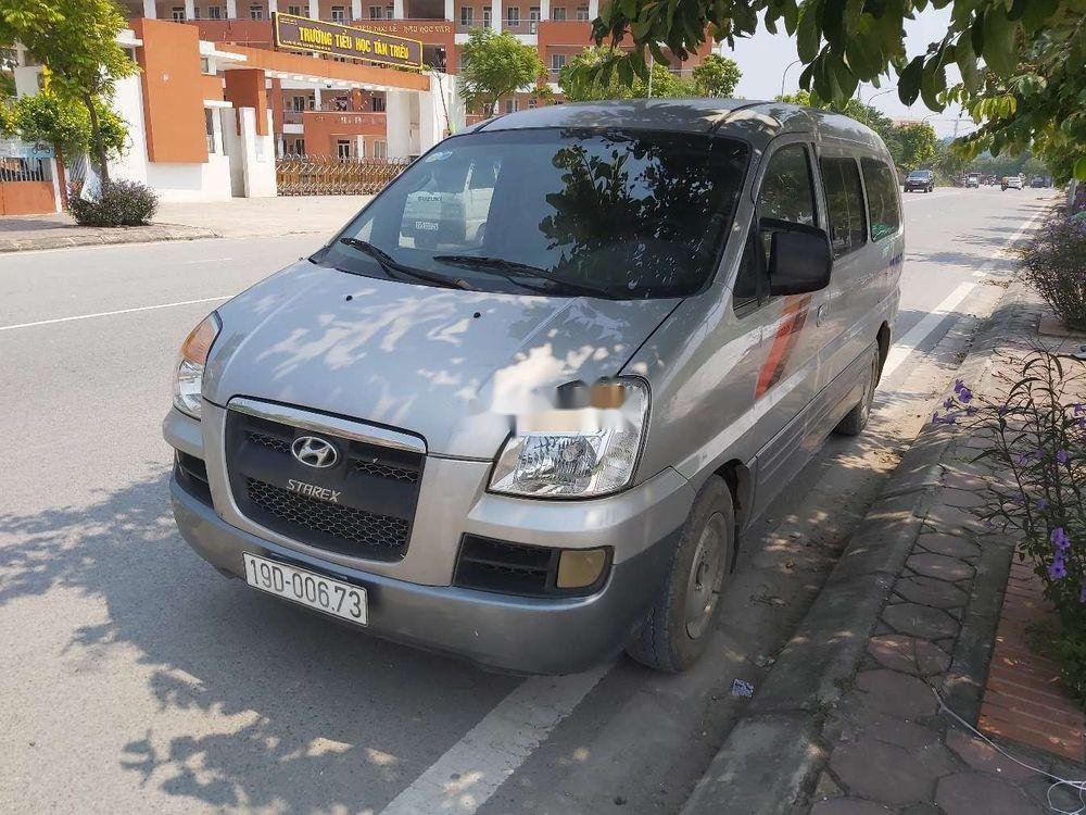 Hyundai Starex 2009 - Gia đình bán xe Hyundai Starex năm sản xuất 2009, màu bạc