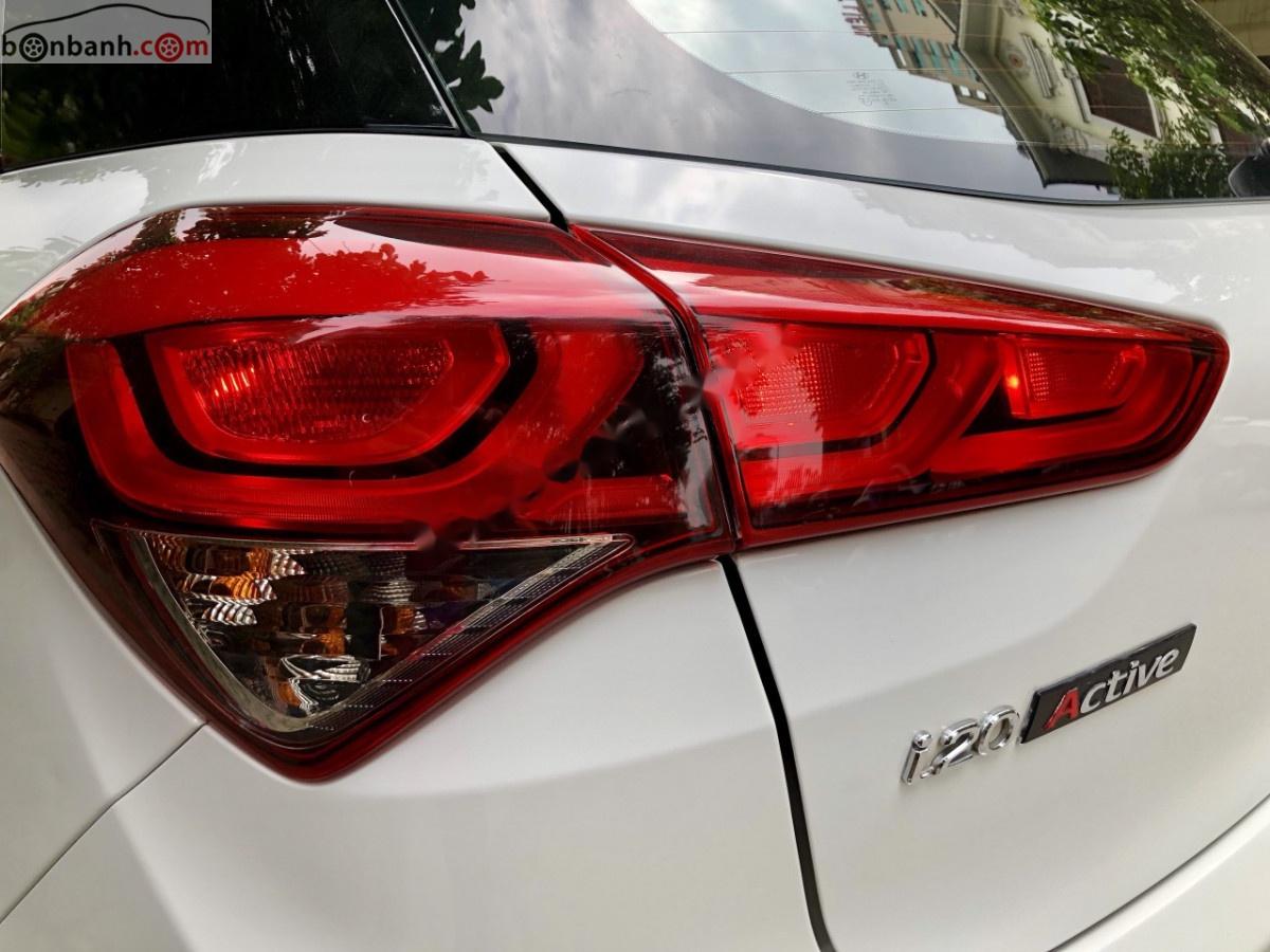 Hyundai i20 Active  1.4 AT 2015 - Bán Hyundai i20 Active 1.4 AT đời 2015, màu trắng, nhập khẩu  