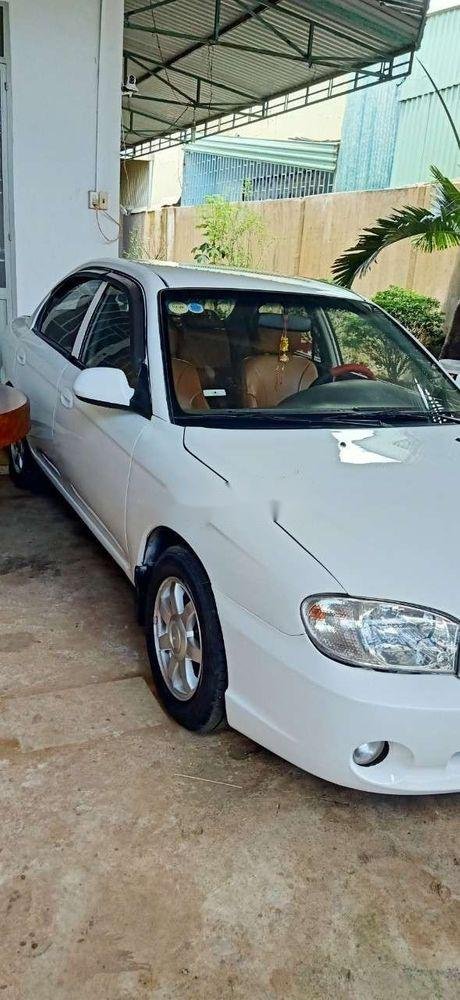 Kia Spectra   2004 - Cần bán gấp Kia Spectra năm 2004, màu trắng