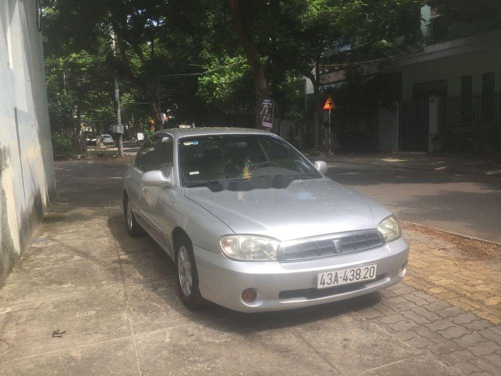 Kia Spectra 2005 - Gia đình bán Kia Spectra 2005, màu bạc