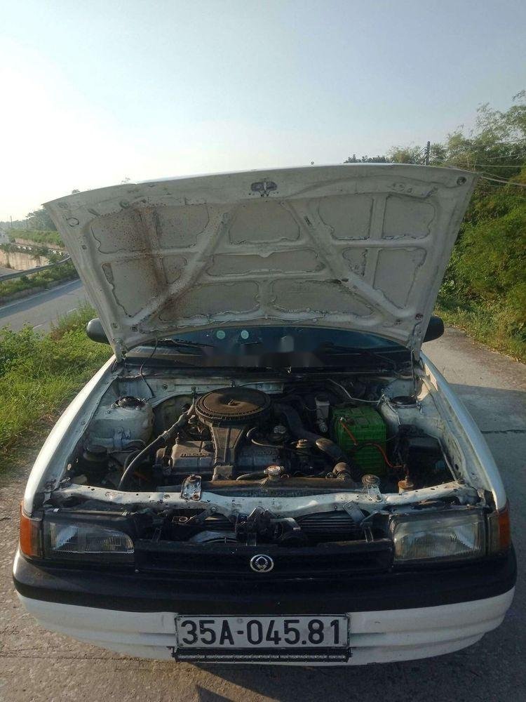 Mazda 323F   1995 - Nhà bán Mazda 323F sản xuất 1995, màu trắng