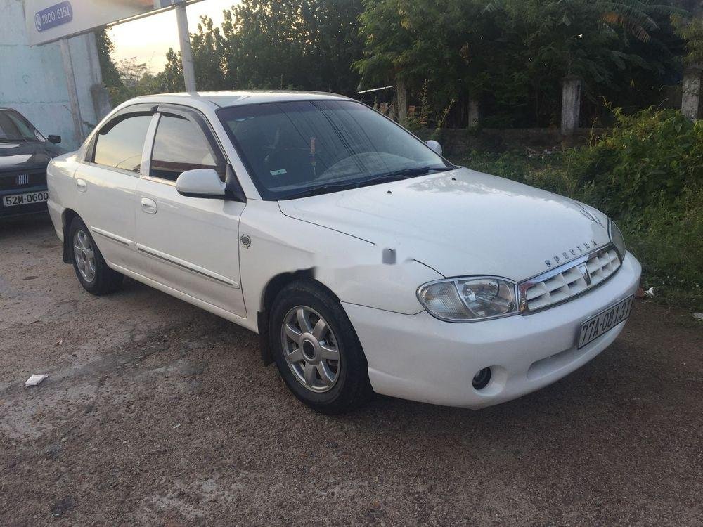 Kia Spectra 2003 - Cần bán gấp Kia Spectra 2003, màu trắng, nhập khẩu nguyên chiếc, chính chủ