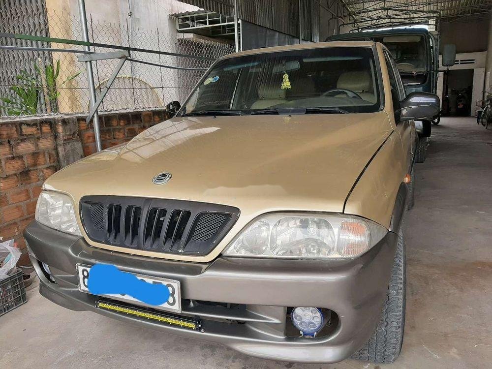 Ssangyong Musso 2001 - Bán xe Ssangyong Musso sản xuất 2001, màu vàng, xe nhập 