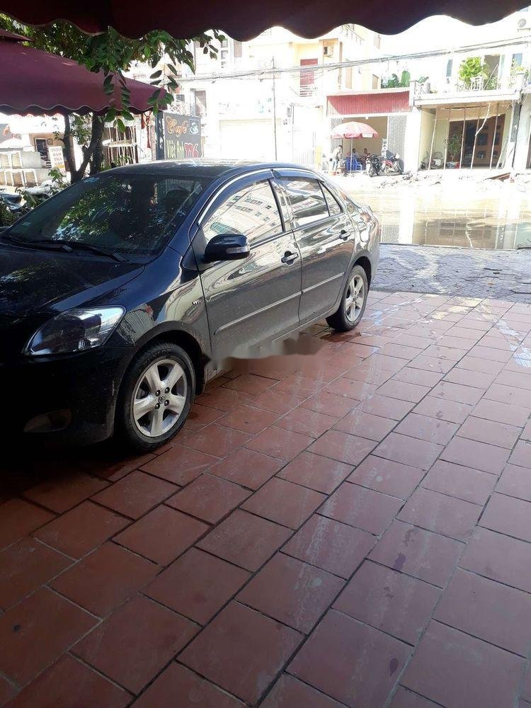 Toyota Vios 2009 - Gia đình bán xe Toyota Vios E đời 2009, màu đen, giá 240tr