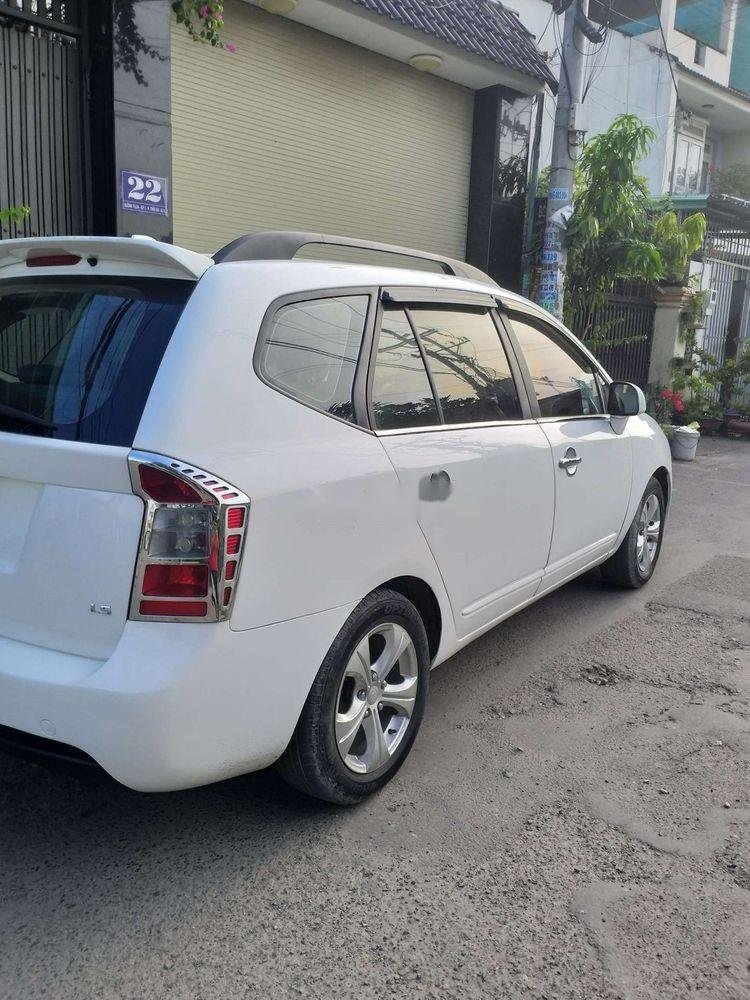 Kia Carens   2010 - Cần bán Kia Carens đời 2010, màu trắng số sàn