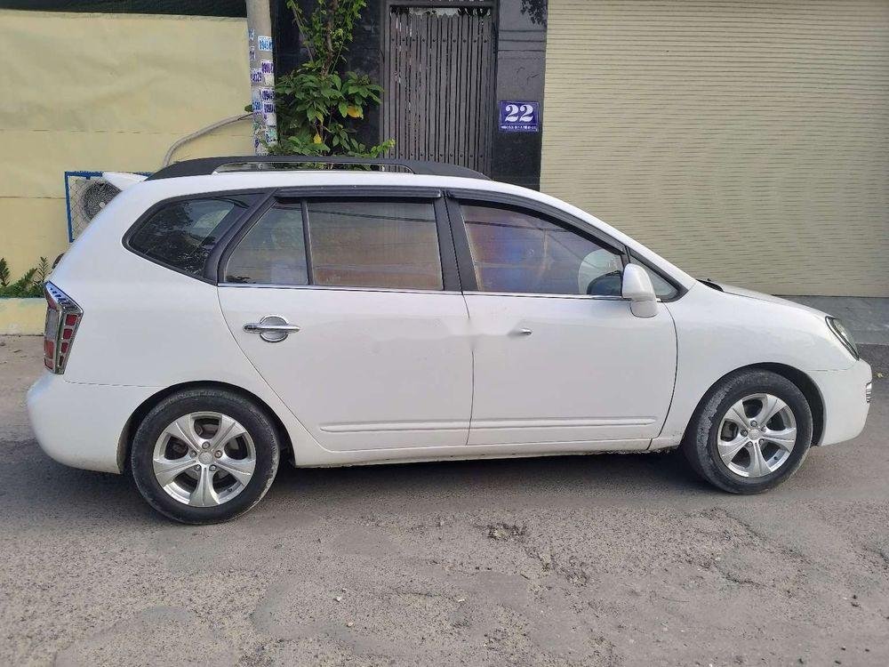 Kia Carens   2010 - Cần bán Kia Carens đời 2010, màu trắng số sàn