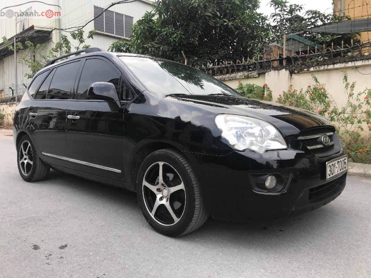 Kia Carens 2010 - Gia đình nâng đời bán Kia Carens 2010, màu đen số tự động