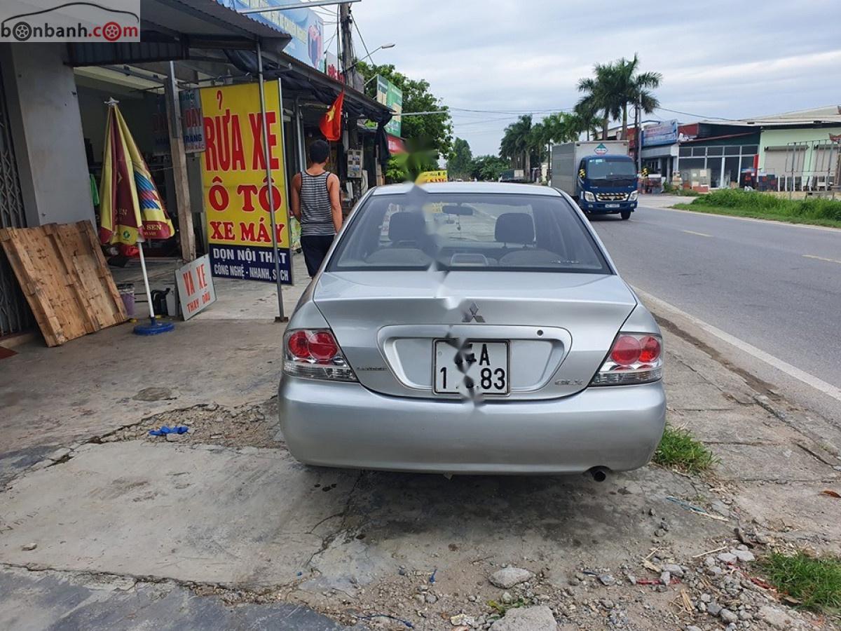 Mitsubishi Lancer GLX 1.6 AT 2004 - Cần bán Mitsubishi Lancer GLX 1.6 AT đời 2004, màu bạc  