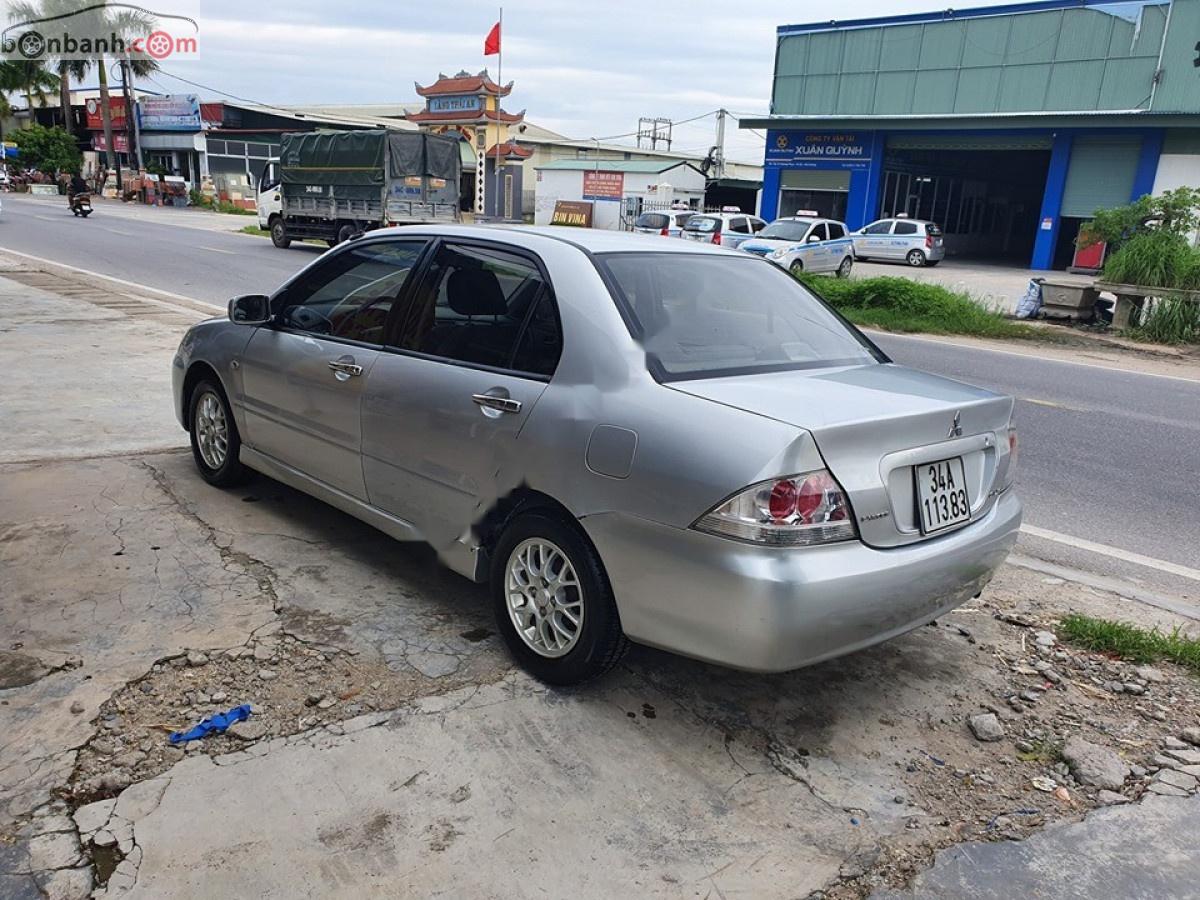 Mitsubishi Lancer GLX 1.6 AT 2004 - Cần bán Mitsubishi Lancer GLX 1.6 AT đời 2004, màu bạc  