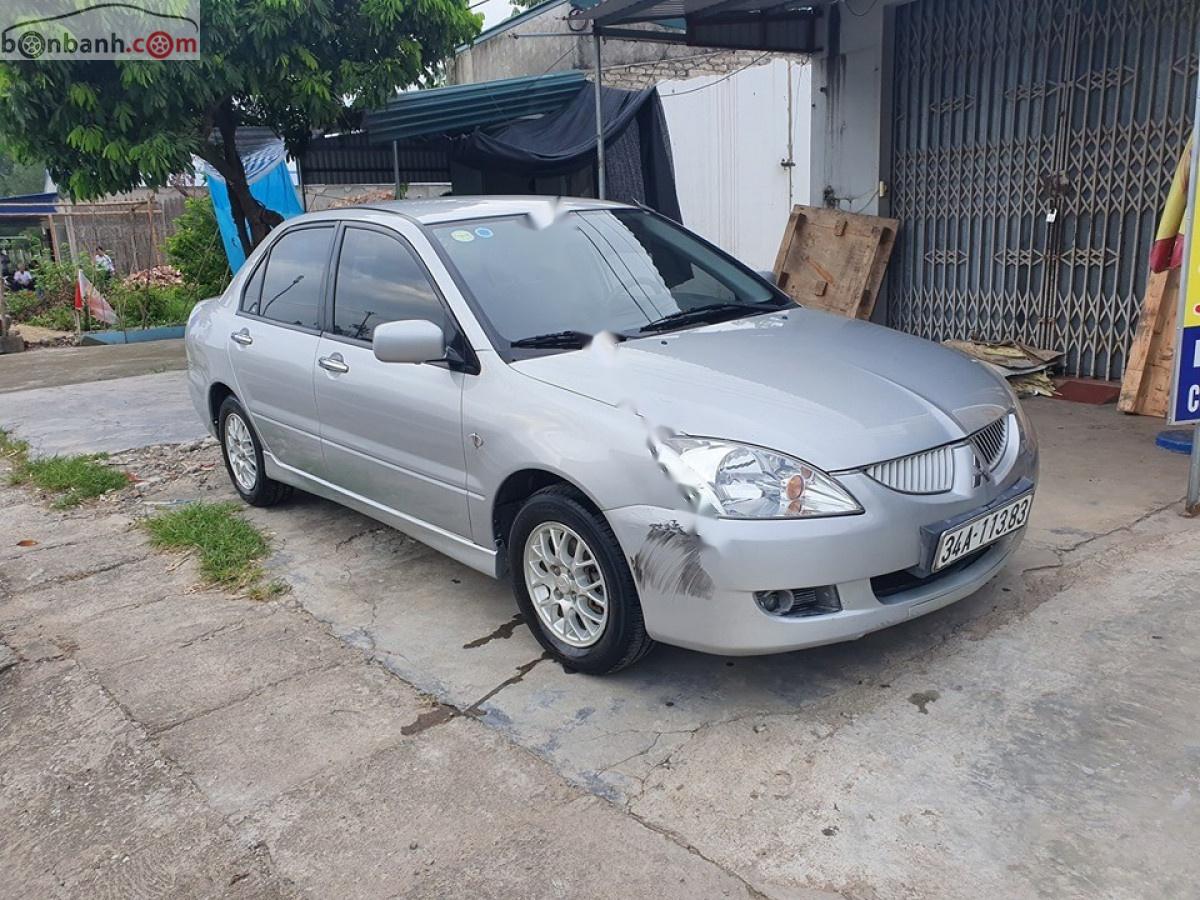 Mitsubishi Lancer GLX 1.6 AT 2004 - Cần bán Mitsubishi Lancer GLX 1.6 AT đời 2004, màu bạc  