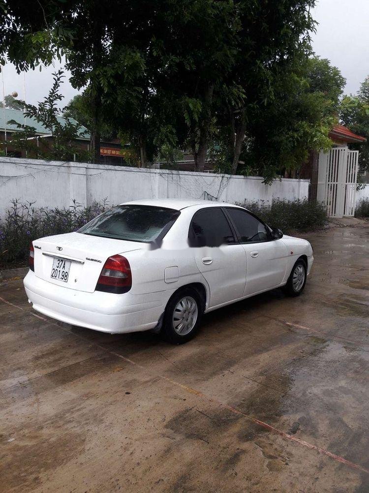 Daewoo Nubira MT 2002 - Cần bán gấp Daewoo Nubira MT đời 2002, màu trắng, nhập khẩu