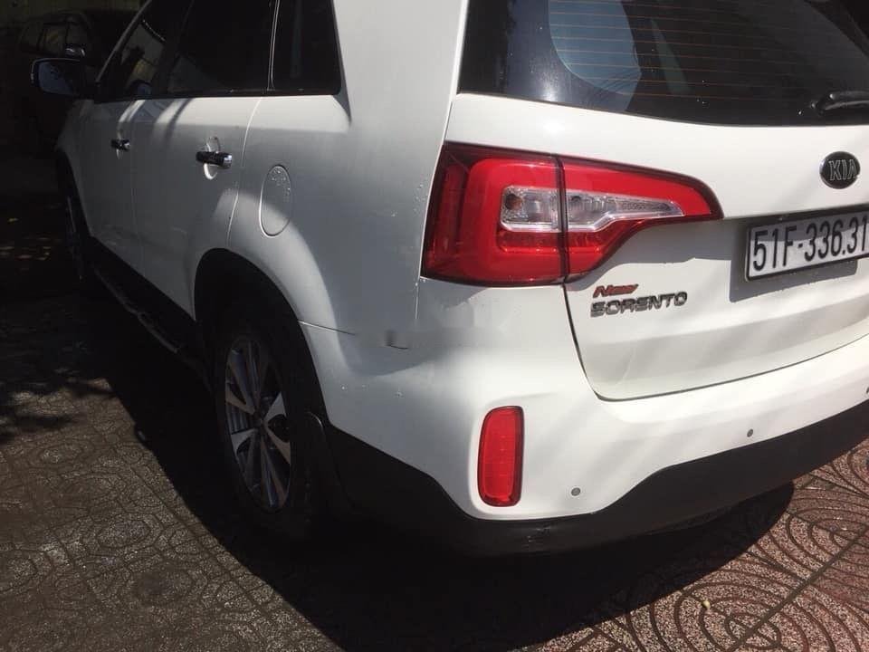 Kia Sorento 2015 - Cần bán lại xe Kia Sorento đời 2015, màu trắng, nhập khẩu, xe gia đình